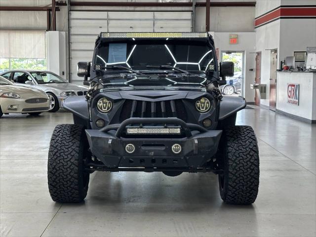 used 2016 Jeep Wrangler Unlimited car, priced at $20,997
