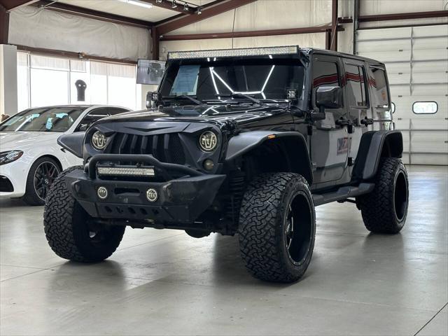 used 2016 Jeep Wrangler Unlimited car, priced at $20,997