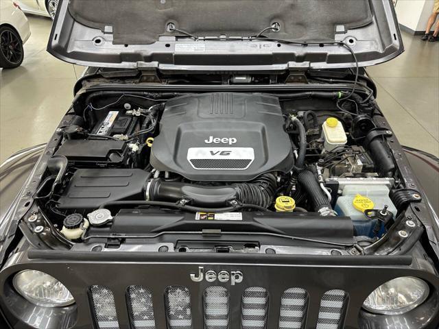 used 2014 Jeep Wrangler Unlimited car, priced at $18,997