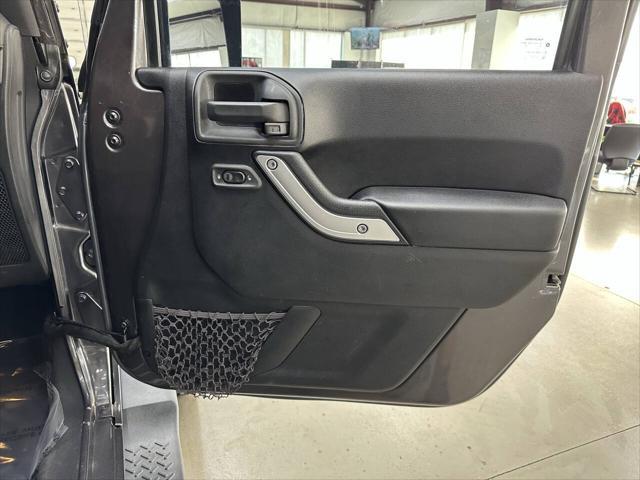 used 2014 Jeep Wrangler Unlimited car, priced at $18,997
