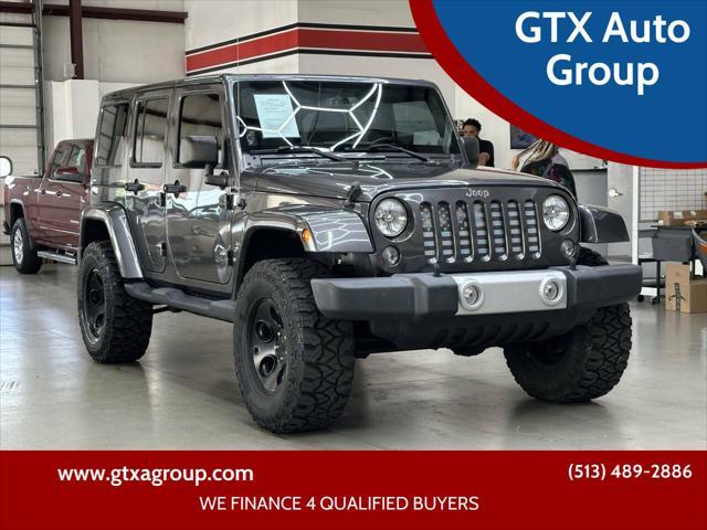 used 2014 Jeep Wrangler Unlimited car, priced at $18,997