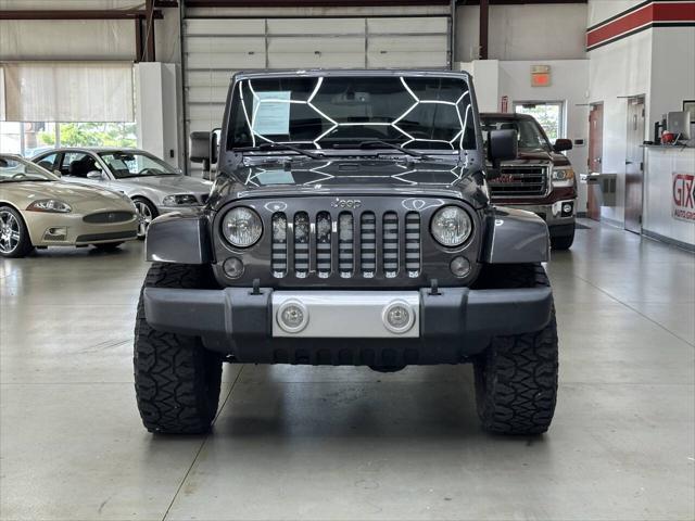 used 2014 Jeep Wrangler Unlimited car, priced at $18,997