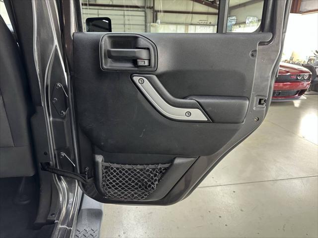 used 2014 Jeep Wrangler Unlimited car, priced at $18,997