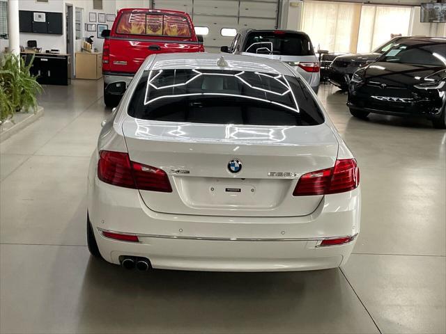 used 2016 BMW 528 car, priced at $16,497