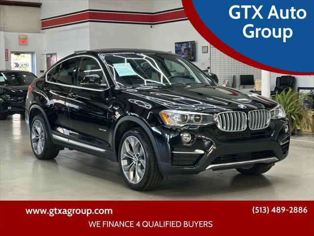 used 2018 BMW X4 car, priced at $19,997