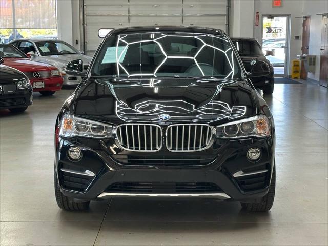 used 2018 BMW X4 car, priced at $19,997