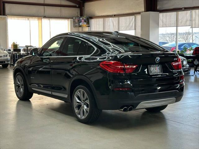 used 2018 BMW X4 car, priced at $19,997