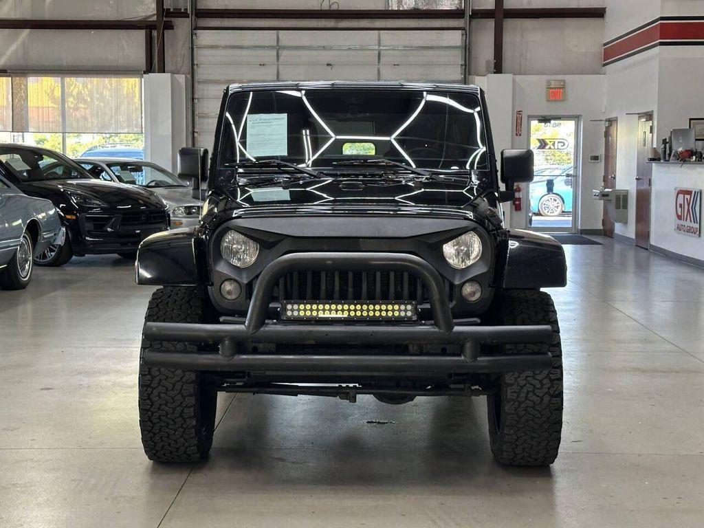 used 2015 Jeep Wrangler Unlimited car, priced at $9,997