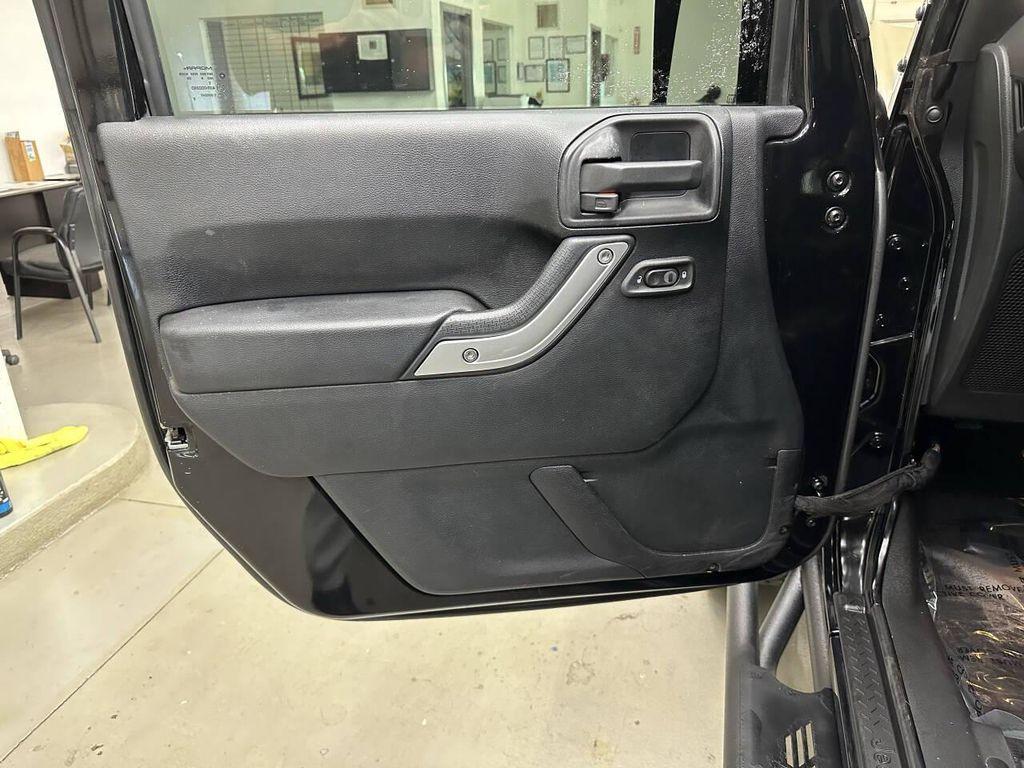 used 2015 Jeep Wrangler Unlimited car, priced at $9,997
