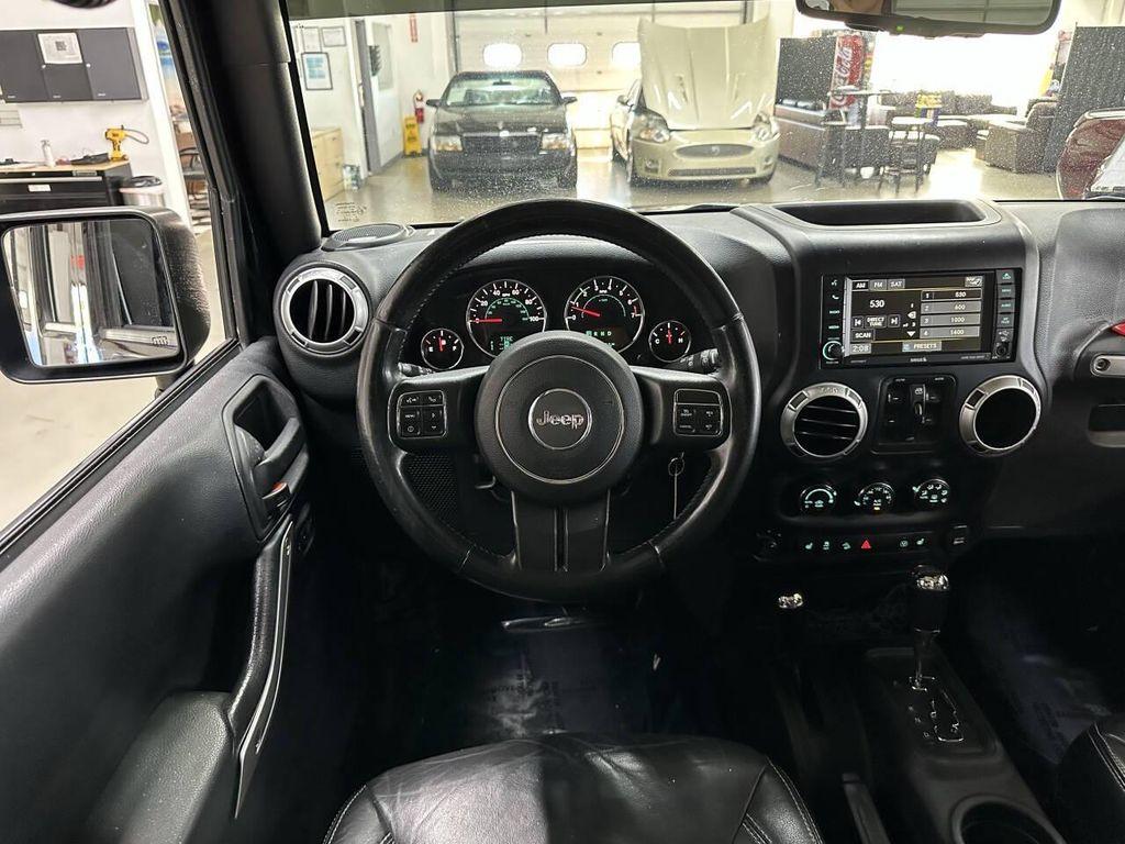used 2015 Jeep Wrangler Unlimited car, priced at $9,997