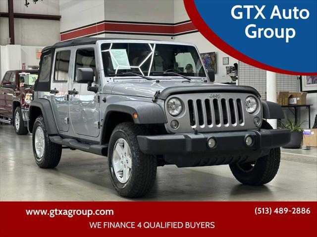 used 2014 Jeep Wrangler Unlimited car, priced at $8,997
