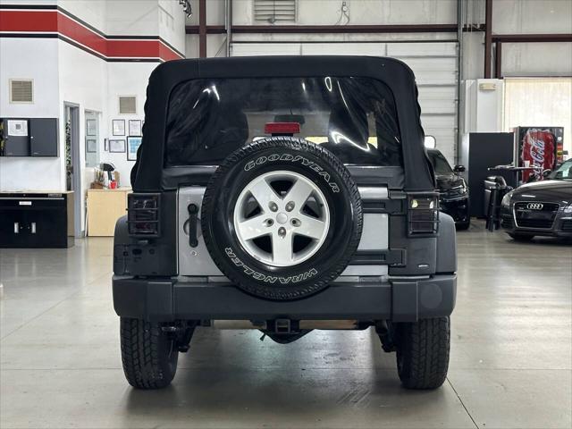 used 2014 Jeep Wrangler Unlimited car, priced at $8,997