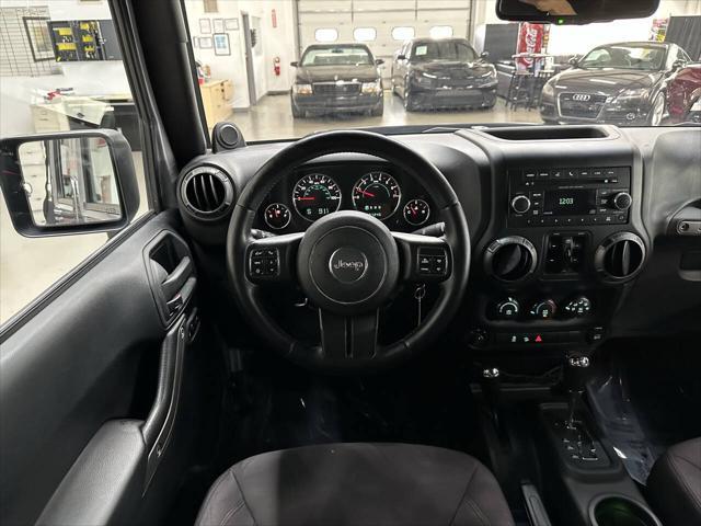 used 2014 Jeep Wrangler Unlimited car, priced at $8,997