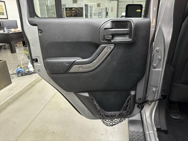 used 2014 Jeep Wrangler Unlimited car, priced at $8,997