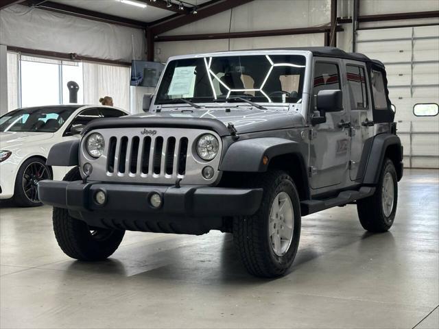 used 2014 Jeep Wrangler Unlimited car, priced at $8,997