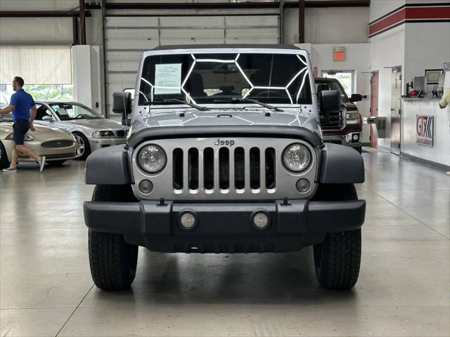 used 2014 Jeep Wrangler Unlimited car, priced at $8,997