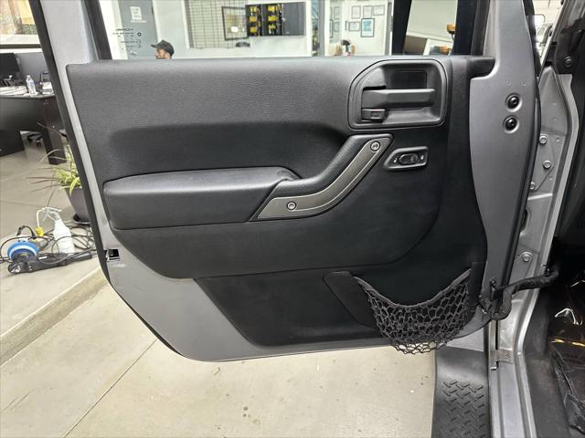 used 2014 Jeep Wrangler Unlimited car, priced at $8,997