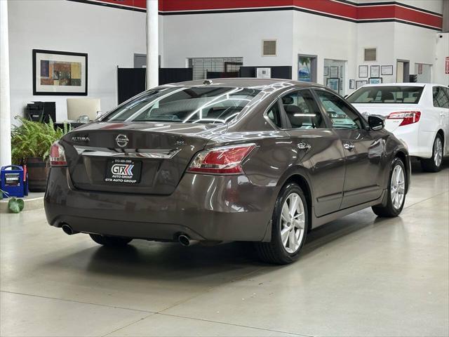 used 2015 Nissan Altima car, priced at $9,999