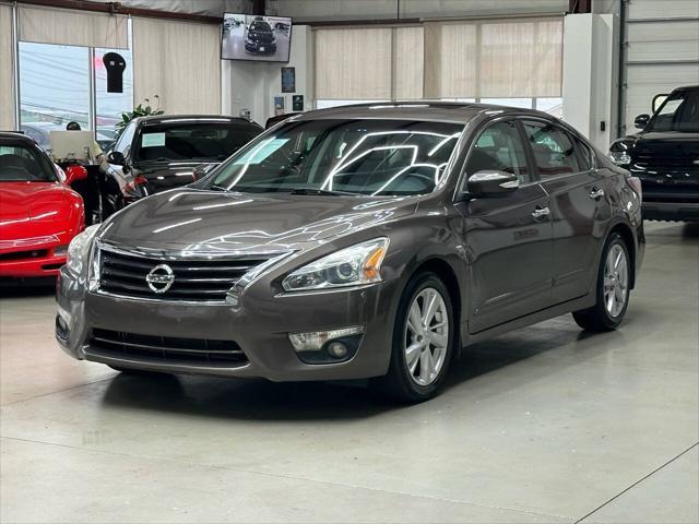 used 2015 Nissan Altima car, priced at $9,999