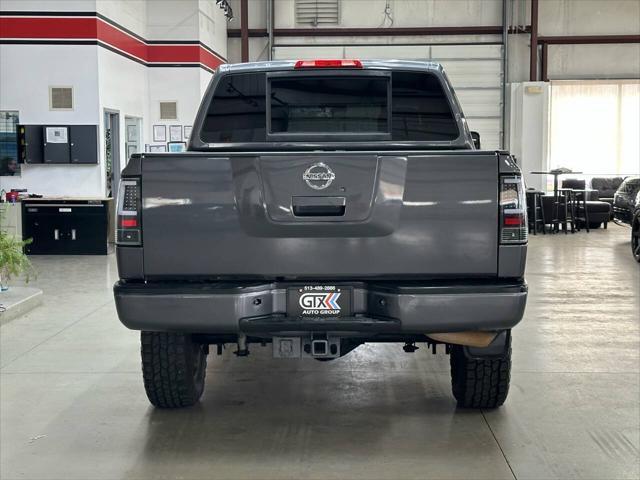 used 2010 Nissan Titan car, priced at $12,850