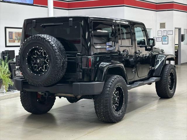 used 2012 Jeep Wrangler Unlimited car, priced at $15,997