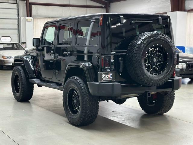 used 2012 Jeep Wrangler Unlimited car, priced at $15,997