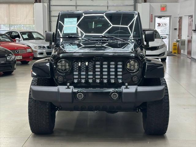 used 2012 Jeep Wrangler Unlimited car, priced at $15,997