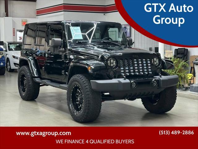 used 2012 Jeep Wrangler Unlimited car, priced at $15,997