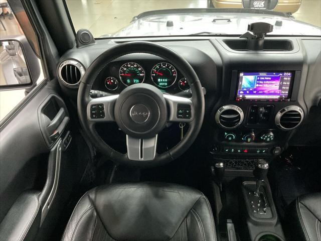 used 2013 Jeep Wrangler Unlimited car, priced at $17,497