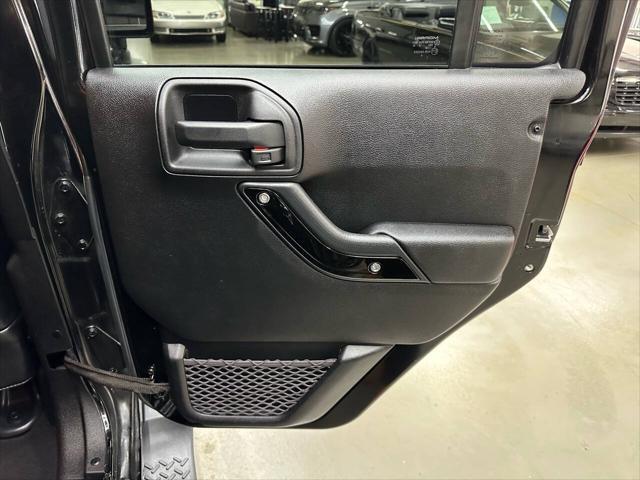 used 2012 Jeep Wrangler Unlimited car, priced at $17,499