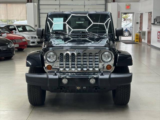 used 2012 Jeep Wrangler Unlimited car, priced at $17,499