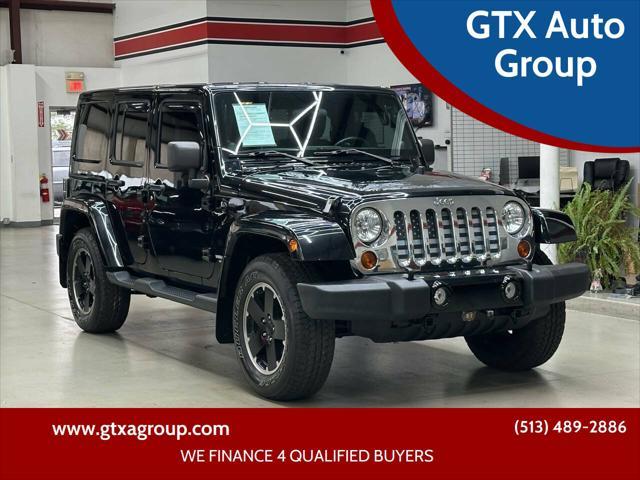 used 2012 Jeep Wrangler Unlimited car, priced at $17,499