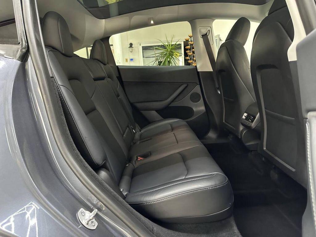 used 2023 Tesla Model Y car, priced at $34,497