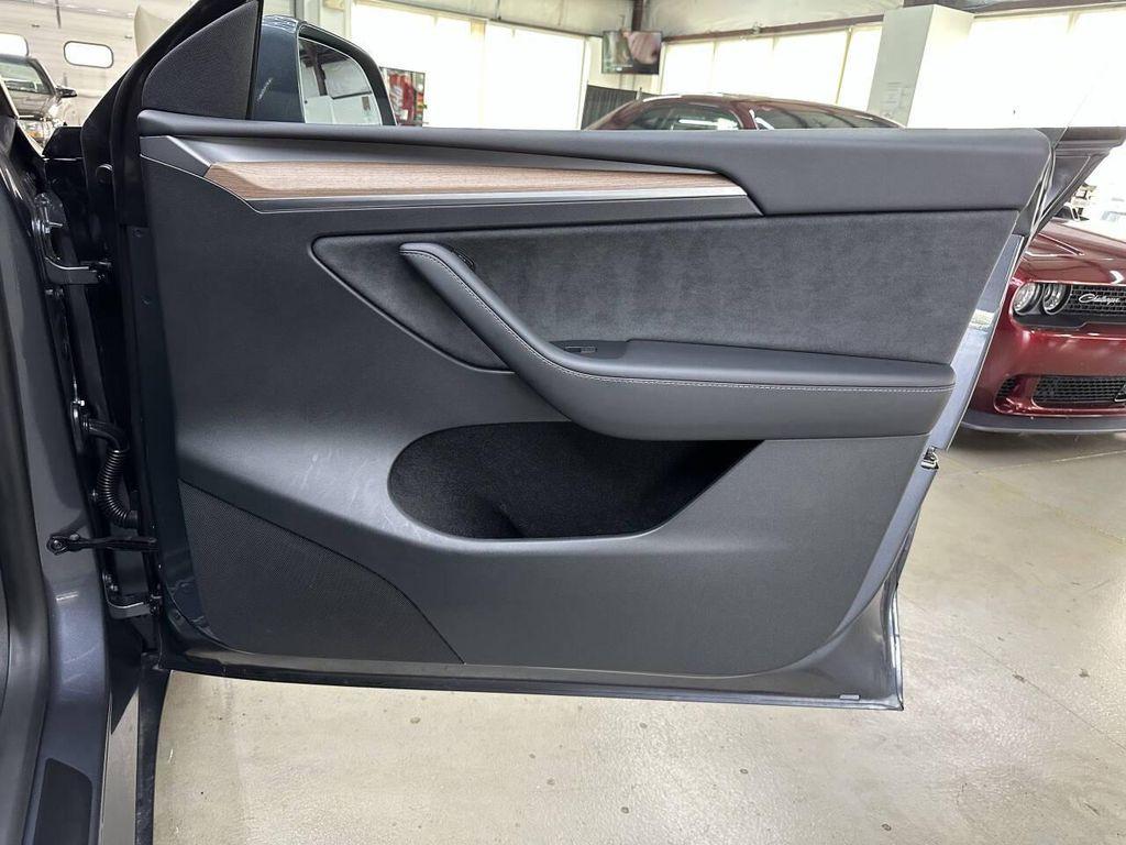 used 2023 Tesla Model Y car, priced at $34,497