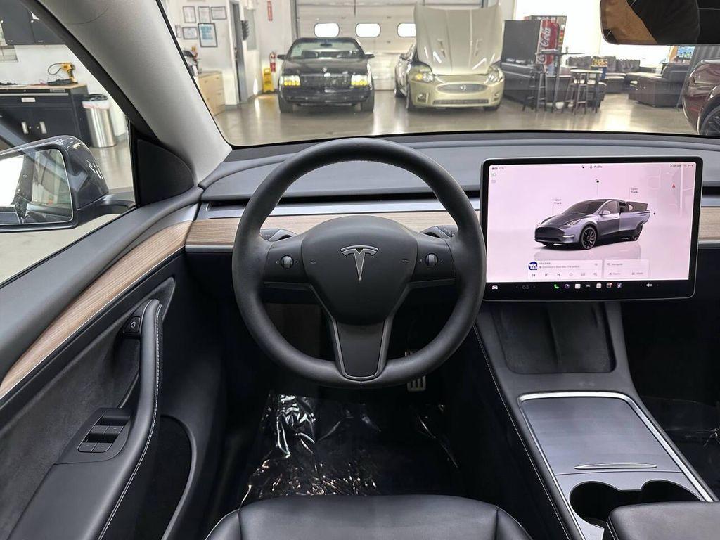 used 2023 Tesla Model Y car, priced at $34,497