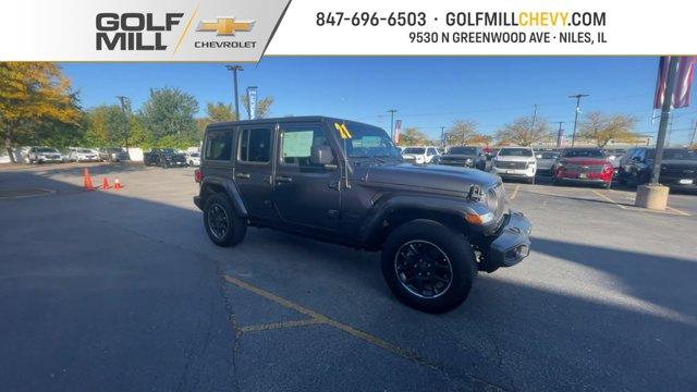 used 2021 Jeep Wrangler Unlimited car, priced at $33,335