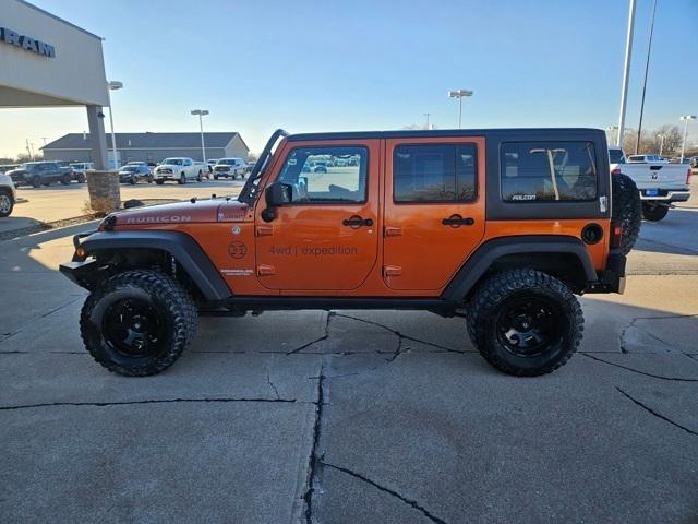 used 2011 Jeep Wrangler Unlimited car, priced at $9,995