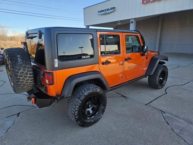 used 2011 Jeep Wrangler Unlimited car, priced at $9,995