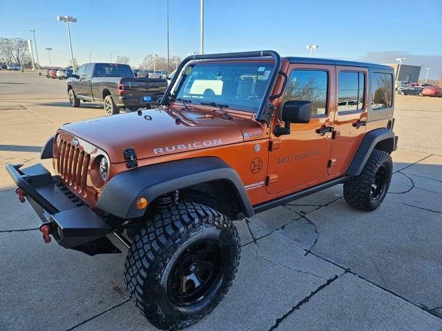 used 2011 Jeep Wrangler Unlimited car, priced at $9,995