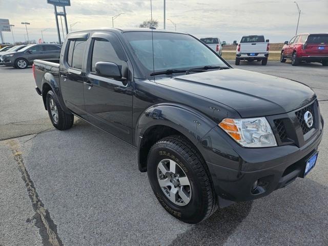 used 2010 Nissan Frontier car, priced at $15,000