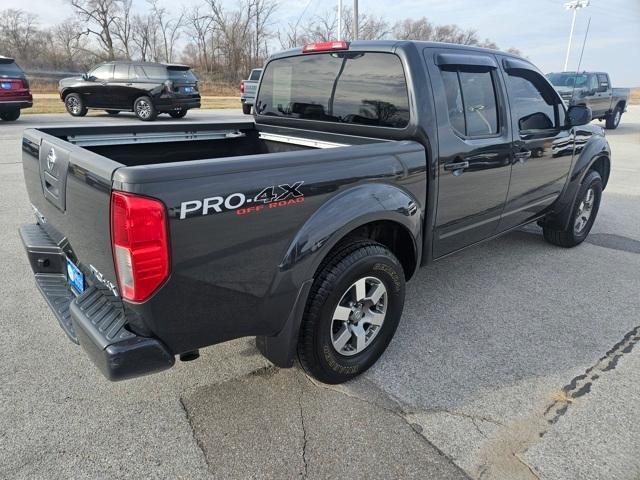 used 2010 Nissan Frontier car, priced at $15,000