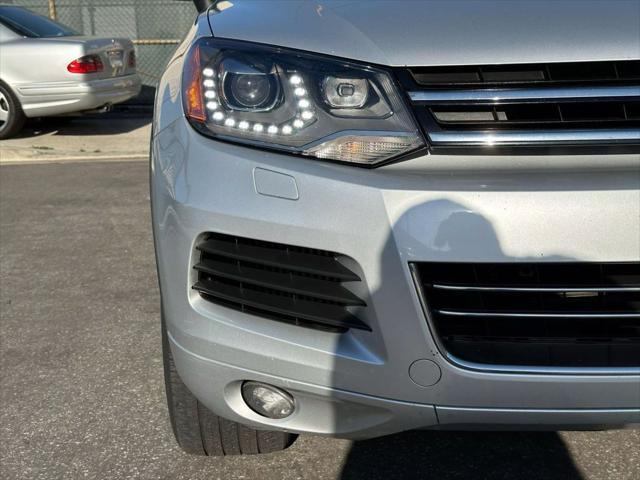 used 2014 Volkswagen Touareg car, priced at $10,990