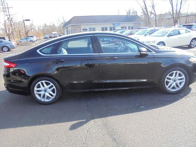 used 2016 Ford Fusion car, priced at $10,888
