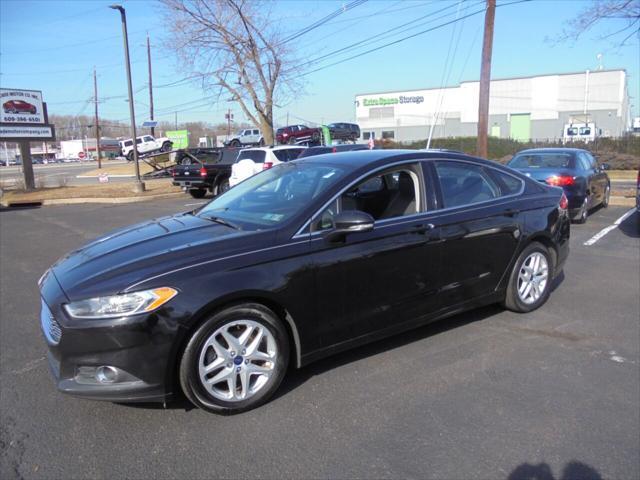 used 2016 Ford Fusion car, priced at $10,888
