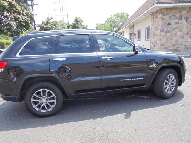 used 2014 Jeep Grand Cherokee car, priced at $14,295