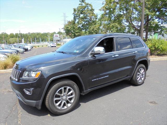 used 2014 Jeep Grand Cherokee car, priced at $14,295