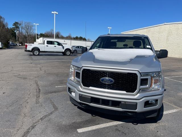 used 2018 Ford F-150 car, priced at $17,488