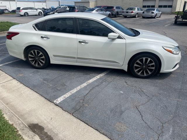 used 2016 Nissan Altima car, priced at $10,000