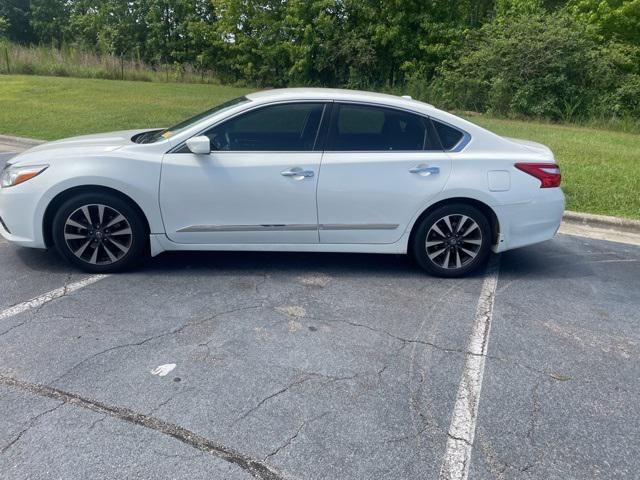 used 2016 Nissan Altima car, priced at $10,000