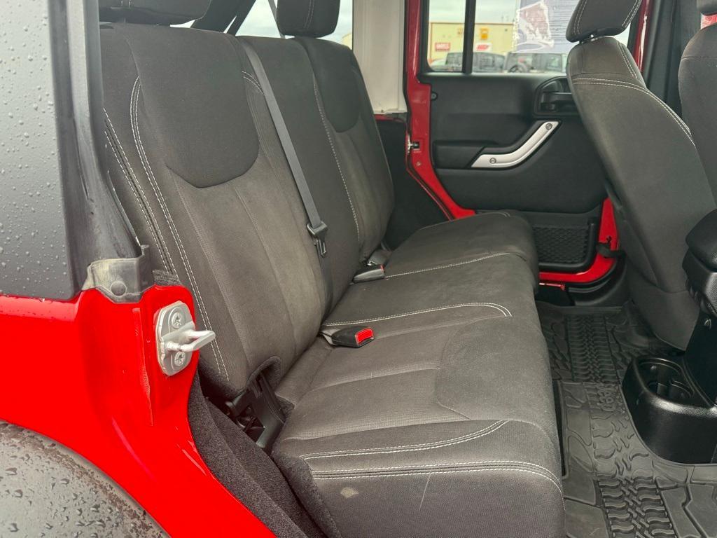 used 2014 Jeep Wrangler Unlimited car, priced at $23,095